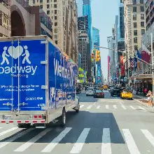 Roadway Moving's truck driving through Manhattan in NYC